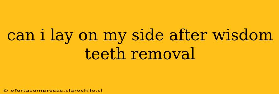 can i lay on my side after wisdom teeth removal