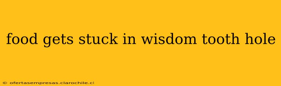 food gets stuck in wisdom tooth hole