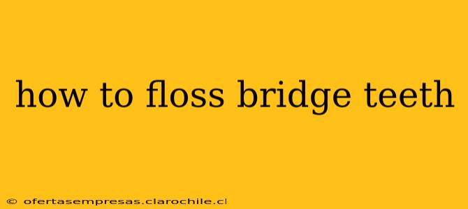 how to floss bridge teeth