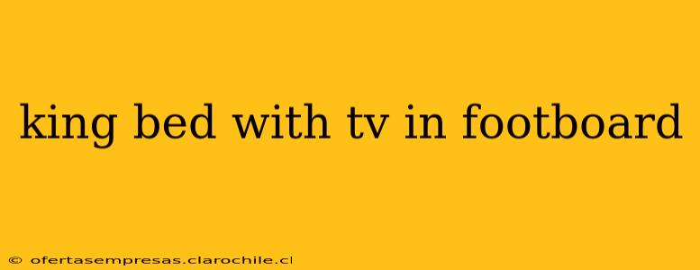 king bed with tv in footboard