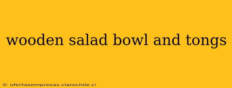 wooden salad bowl and tongs
